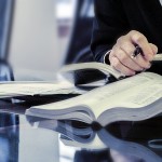 A lawyer doing research, reading books